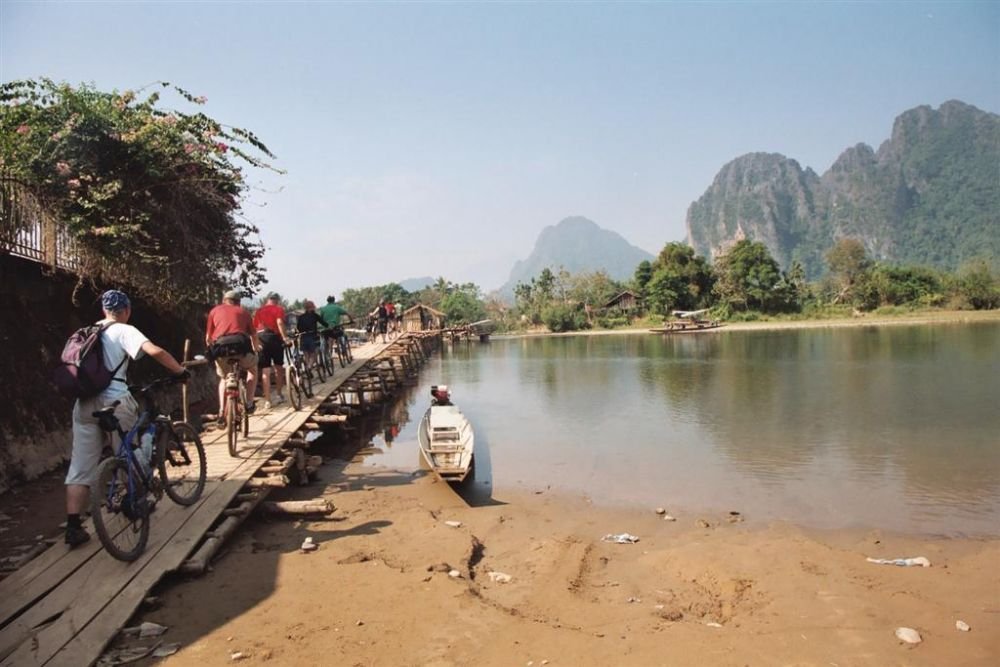 Sculpted by Time: Exploring the Majestic Limestone Landscape of Laos by Electric Bike